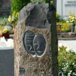 Grabsteinsymbol "Die afrikanischen Masken"